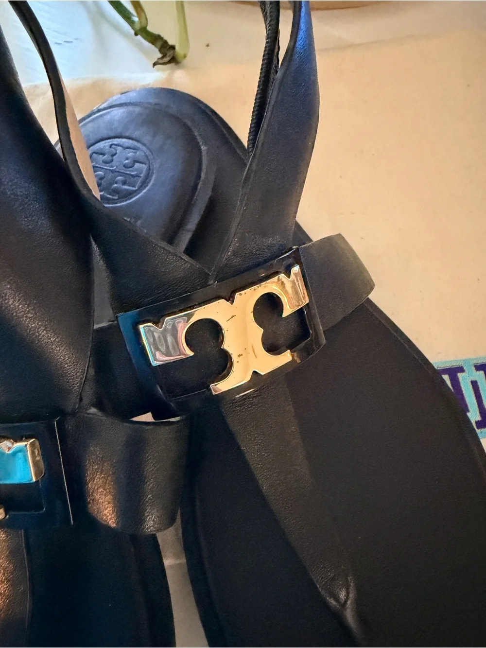 Tory Burch Black Sandals with Gold Logo Accent